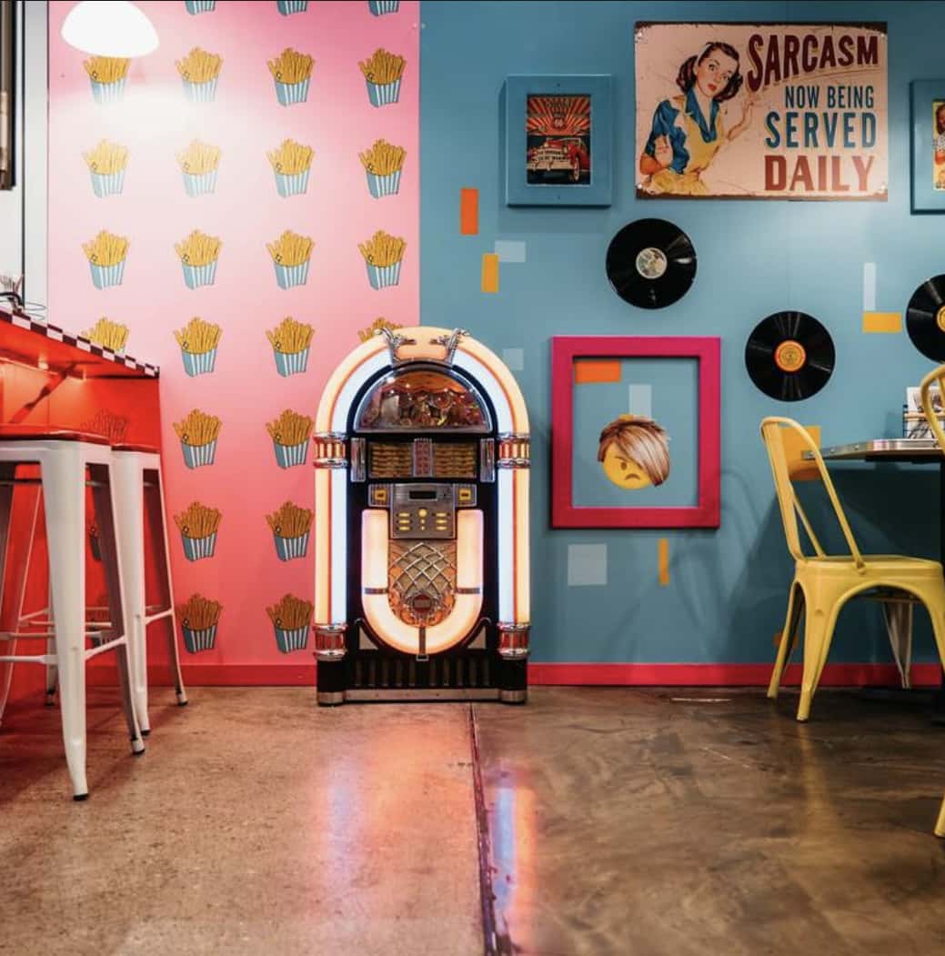 The interactive restaurant's interiors with a sign saying, 'Sarcasm now being served daily' (Karen's Diner)