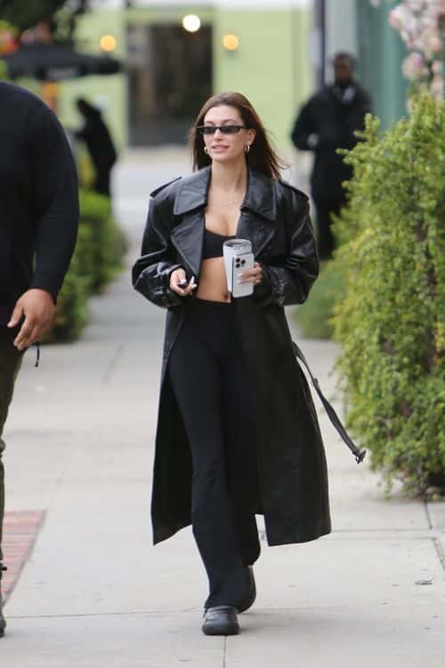 Hailey Bieber faced winter in long leather coat (Backgrid)