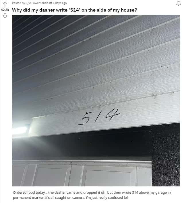 A Reddit user seeks answers after a delivery man scrawled '514' over her garage (Reddit)