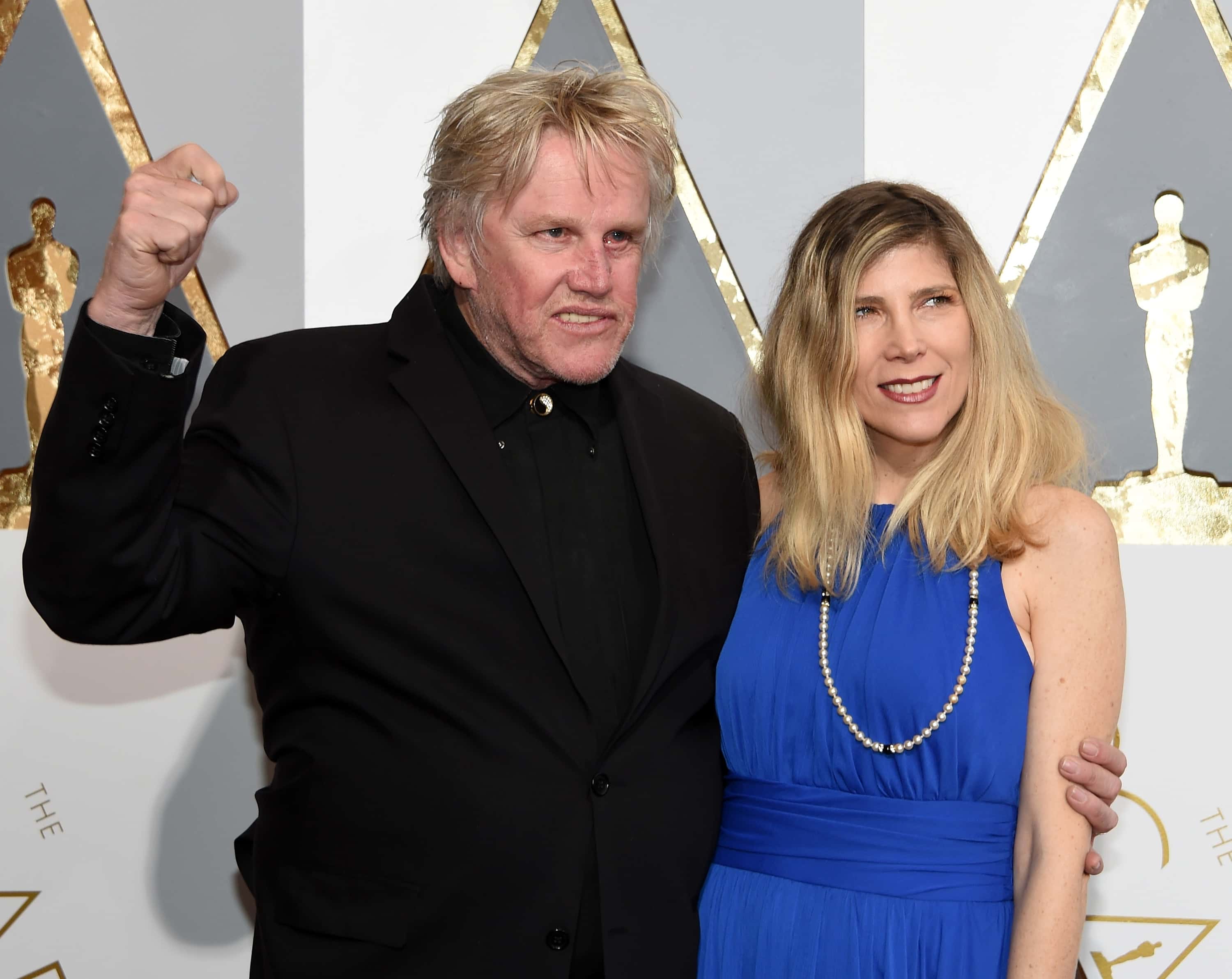 Actor Gary Busey (L) and Steffanie Sampson attend the 88th Annual Academy Awards at Hollywood & Highland Center on February 28, 2016, in Hollywood, California. (Photo by Ethan Miller/Getty Images)