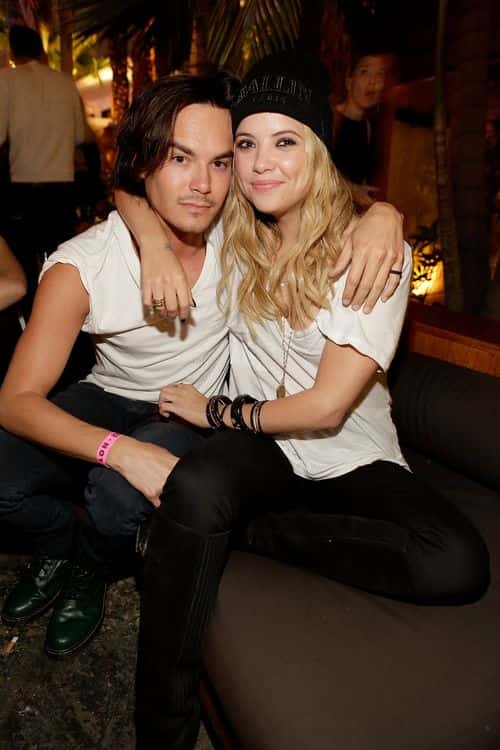 Actors Tyler Blackburn (L) and Ashley Benson attend NYLON and Onitsuka Tiger celebrate the annual May Young Hollywood issue at The Roosevelt Hotel on May 14, 2013 in Hollywood, California.
