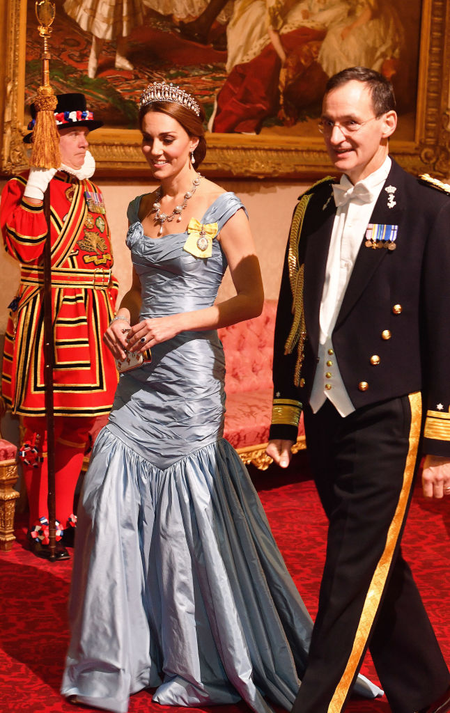 Catherine, Duchess of Cambridge, walks with Rear Admiral Ludger Brummelaar during a State Banquet at Buckingham Palace on October 23, 2018, in London, United Kingdom. (Getty Images)