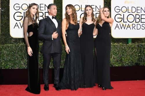 Actor Sylvester Stallone (2nd L), model Jennifer Flavin (C), and (L-R) 2017 Miss Golden Globe Sistine Stallon, Scarlet Stallone and Sophia Stallone attend the 74th Annual Golden Globe Awards at The Beverly Hilton Hotel on January 8, 2017 in Beverly Hills, California.