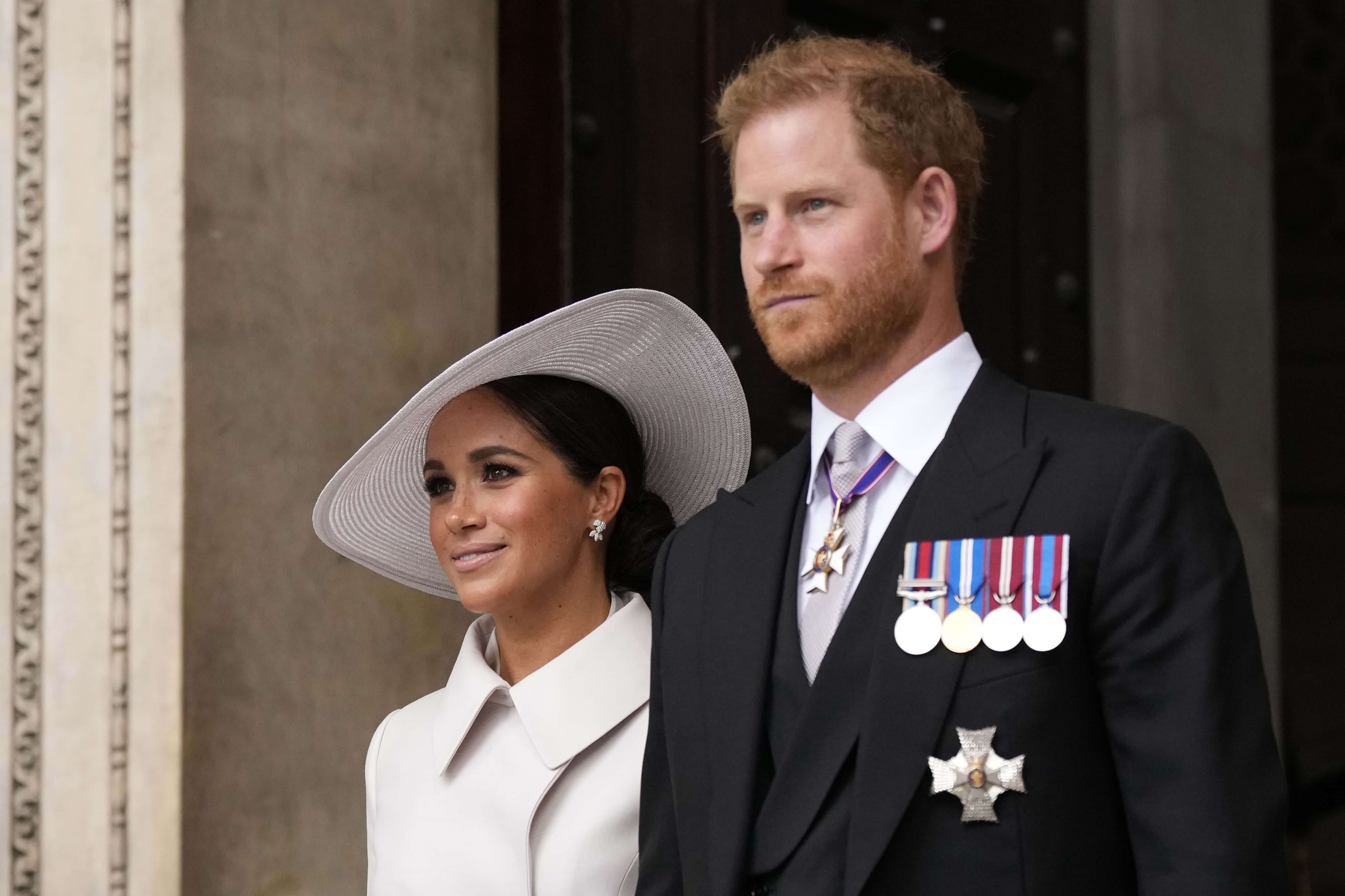 Prince Harry and Meghan Markle, Duke and Duchess of Sussex leave after a service of thanksgiving for the reign of Queen Elizabeth II at St Paul's Cathedral in London, Friday, June 3, 2022 on the second of four days of celebrations to mark the Platinum Jubilee. The events over a long holiday weekend in the U.K. are meant to celebrate the monarch's 70 years of service.