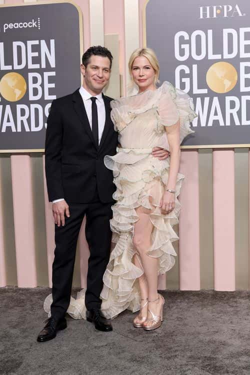 (L-R) Thomas Kail and Michelle Williams attend the 80th Annual Golden Globe Awards at The Beverly Hilton on January 10, 2023 in Beverly Hills, California.
