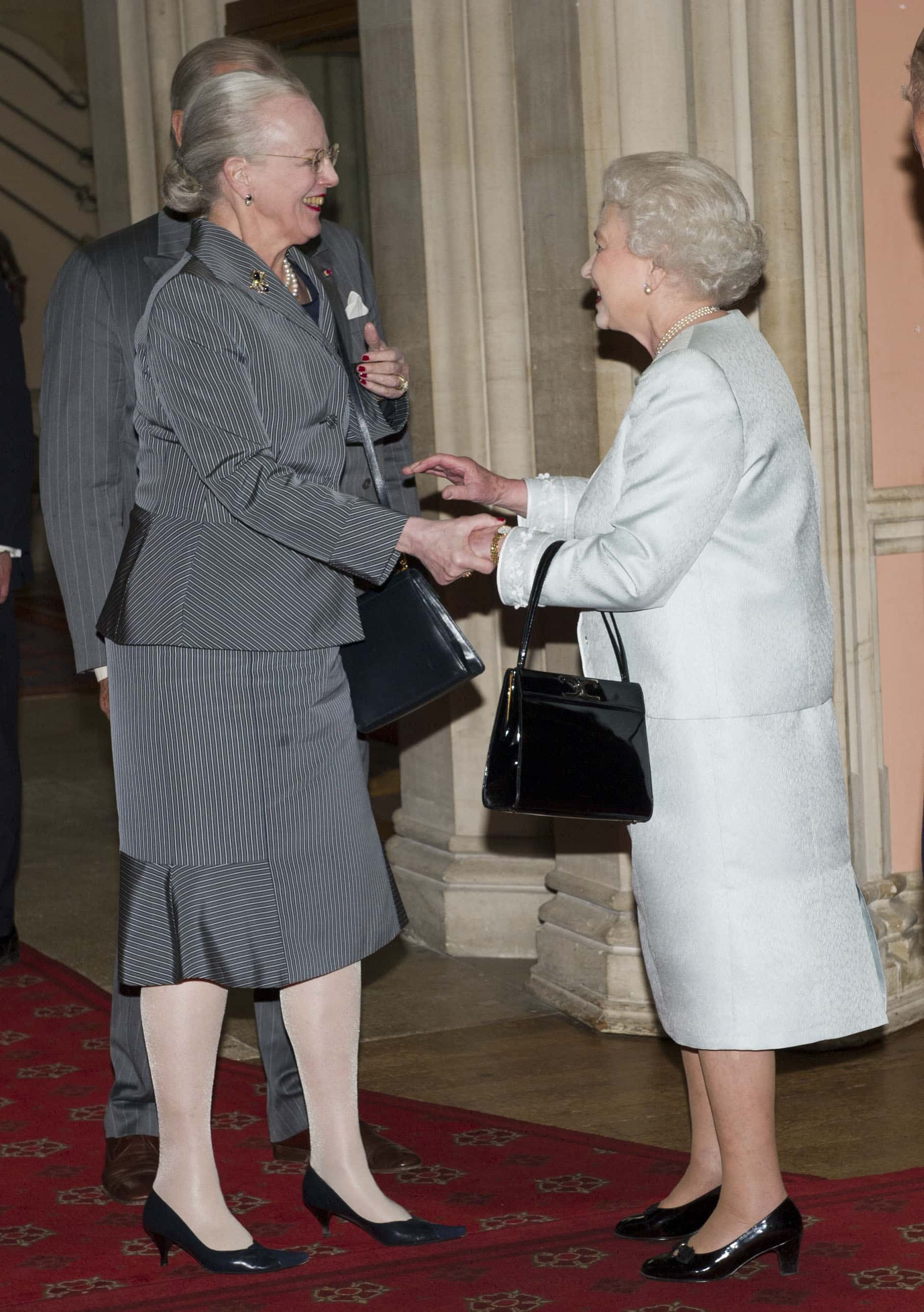 : Queen Elizabeth II greet Queen Margrethe of Denmark as she arrives at a lunch for Sovereign Monarch's held in honour of Queen Elizabeth II's Diamond Jubilee, at Windsor Castle, on May 18, 2012 in Windsor, England. (Photo by Arthur Edwards - WPA Pool/Getty Images)
