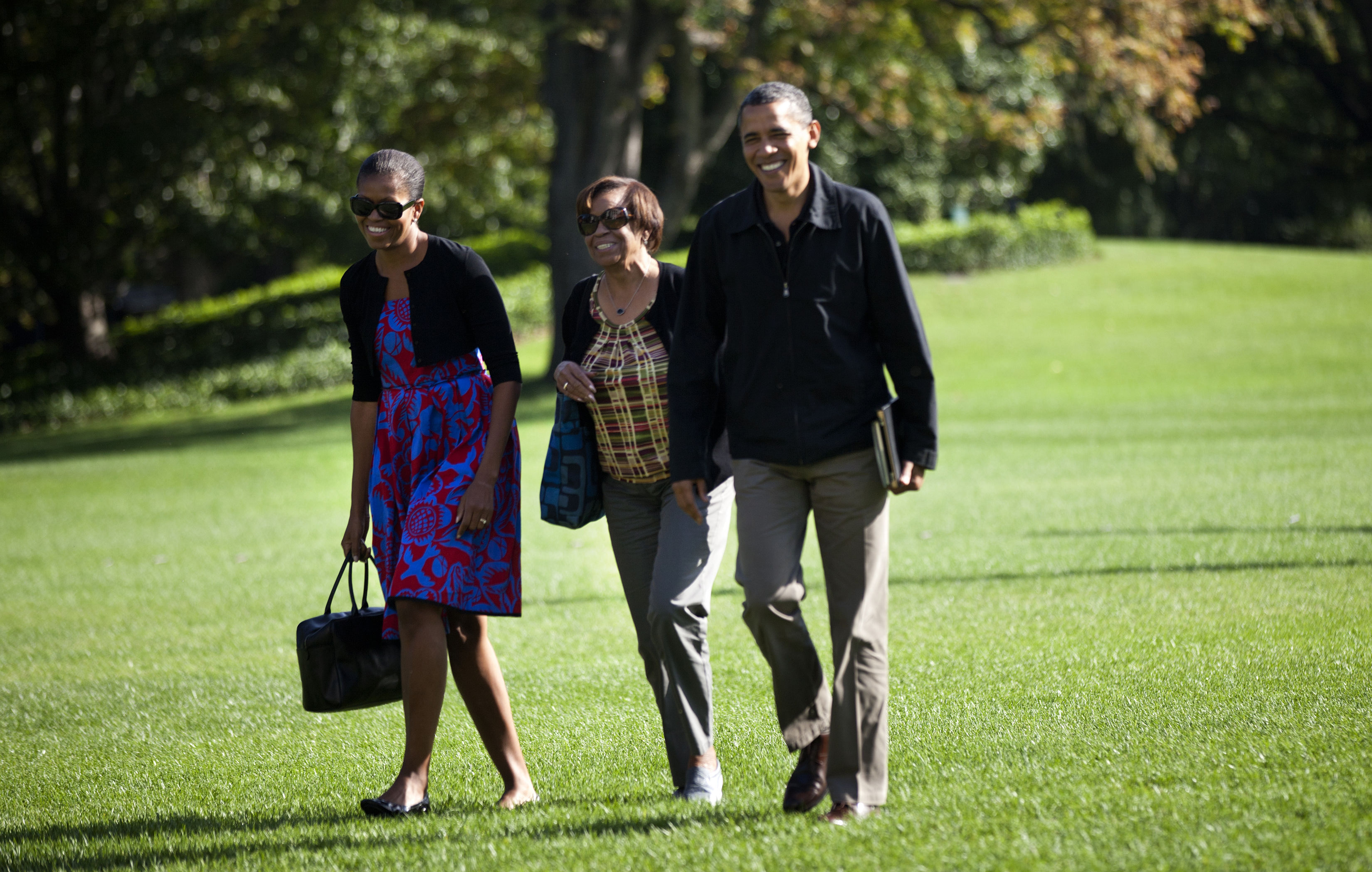 President Barack Obama walks with First Lady Michelle Obama (L) and his mother-in-law Marian Robinson from Marine One to the Residence of the White House October 9, 2011, in Washington, DC. (Getty Images)