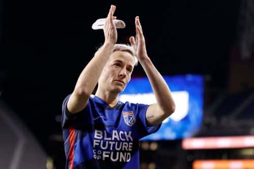 Megan Rapinoe #15 of OL Reign reacts after losing 2-0 against the Kansas City Current in a NWSL semifinal match at Lumen Field on October 23, 2022 in Seattle, Washington.