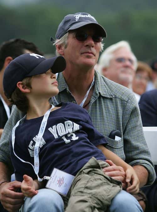 Movie star Richard Gere and son Homer watch the Baseball Hall of Fame induction ceremony on July 29, 2007 at Clark Sports Center in Cooperstown, New York.