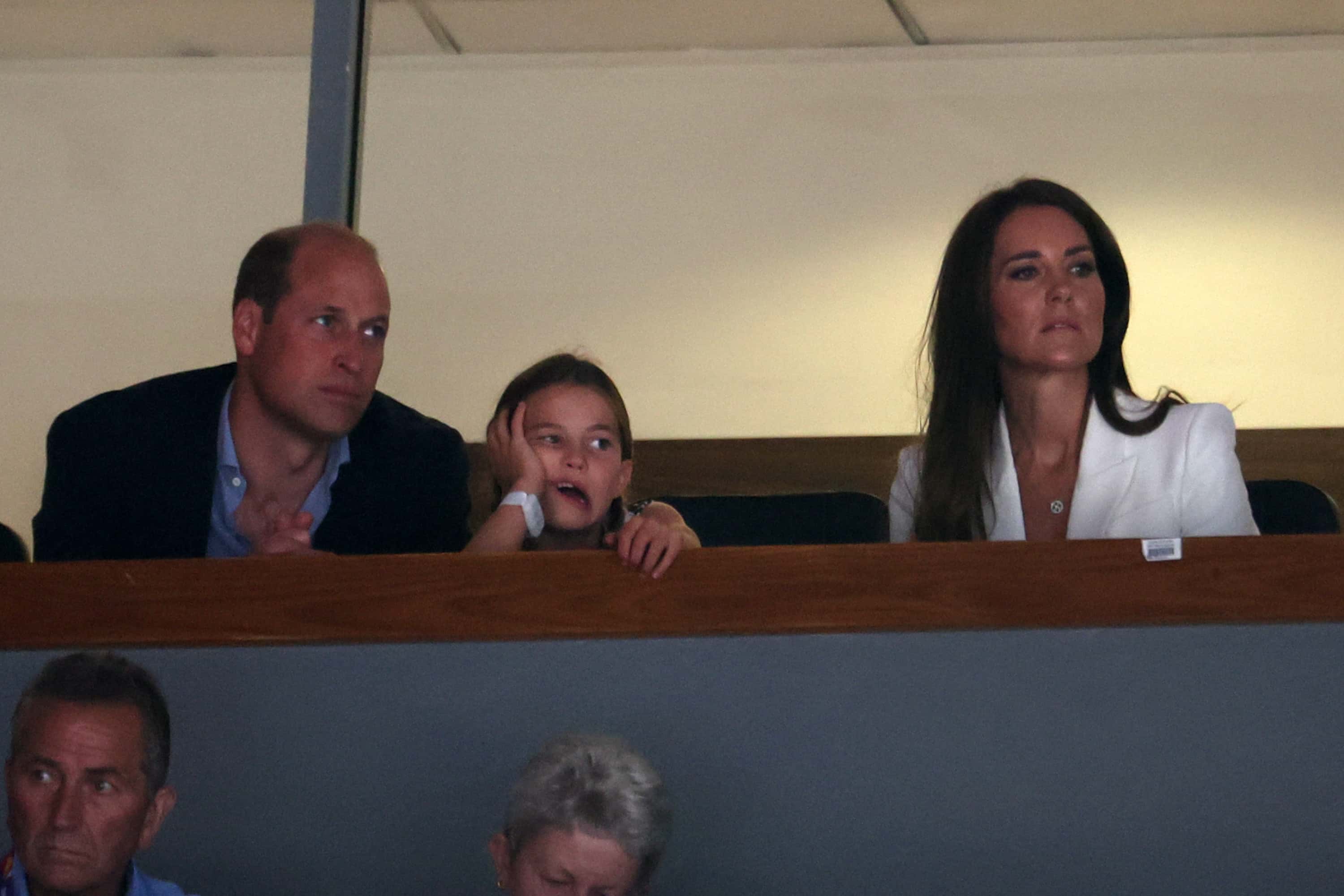 (L-R) Prince William, Duke of Cambridge, Princess Charlotte of Cambridge and Catherine, Duchess of Cambridge look on ahead of Men's Horizontal Bar Final and Women's Floor Exercise Final on day five of the Birmingham 2022 Commonwealth Games at Arena Birmingham on August 02, 2022 on the Birmingham, England.