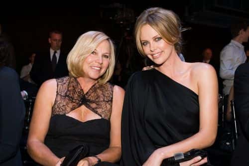 Actress Charlize Theron (R) and her mother Gerda Theron attend the Dior 2008 Cruise collection fashion show on May 14, 2007 in New York City.
