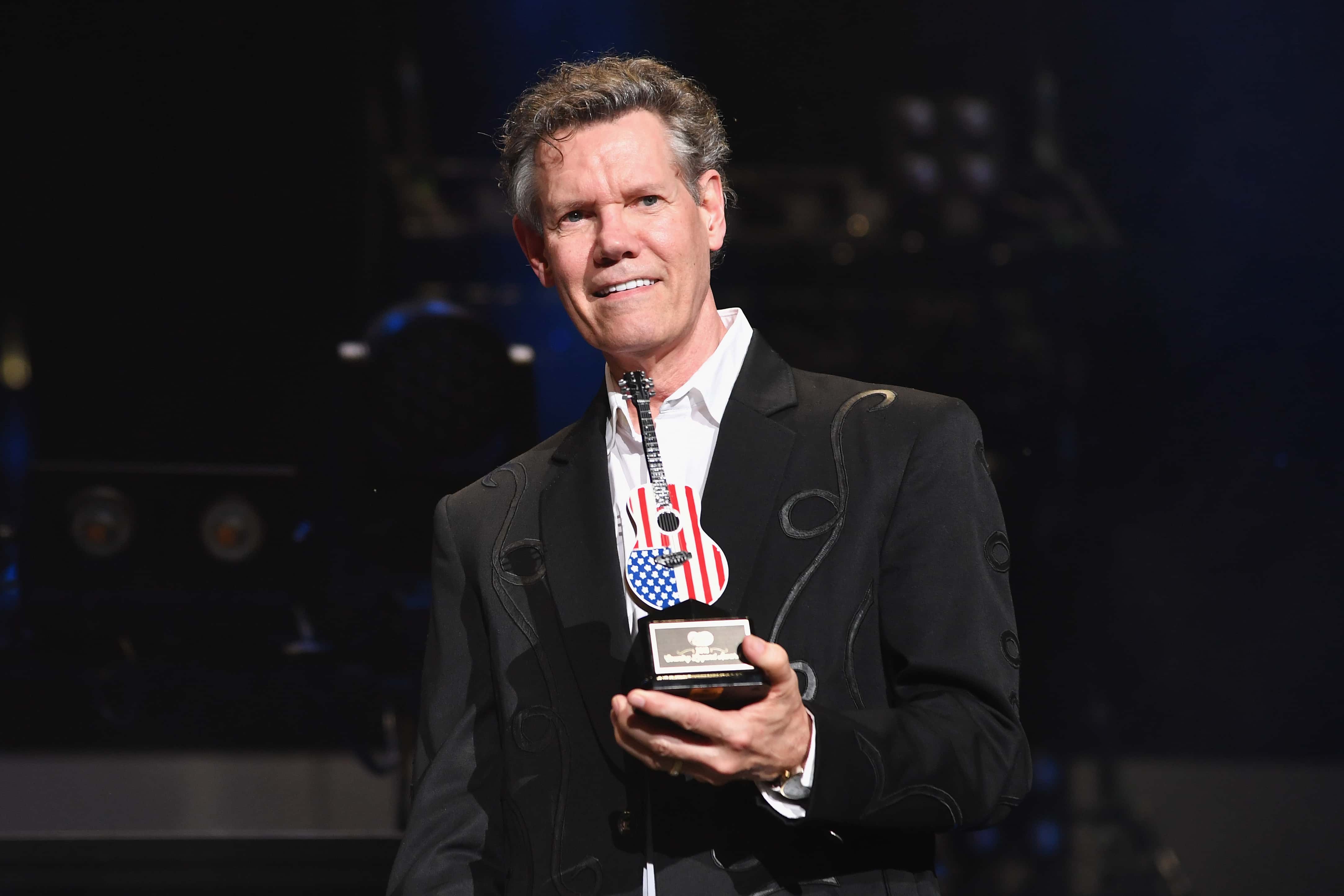 NASHVILLE, TN - JUNE 09:  (EDITORIAL USE ONLY) Randy Travis receives an award during the 2018 CMA Mu