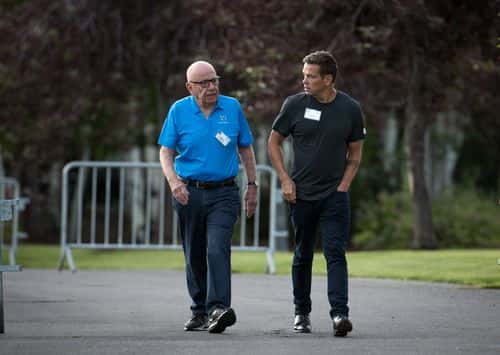 (L to R) Rupert Murdoch, executive chairman of News Corp and chairman of Fox News, and Lachlan Murdoch, co-chairman of 21st Century Fox, walk together as they arrive on the third day of the annual Allen & Company Sun Valley Conference, July 13, 2017 in Sun Valley, Idaho. Every July, some of the world's most wealthy and powerful businesspeople from the media, finance, technology and political spheres converge at the Sun Valley Resort for the exclusive weeklong conference.