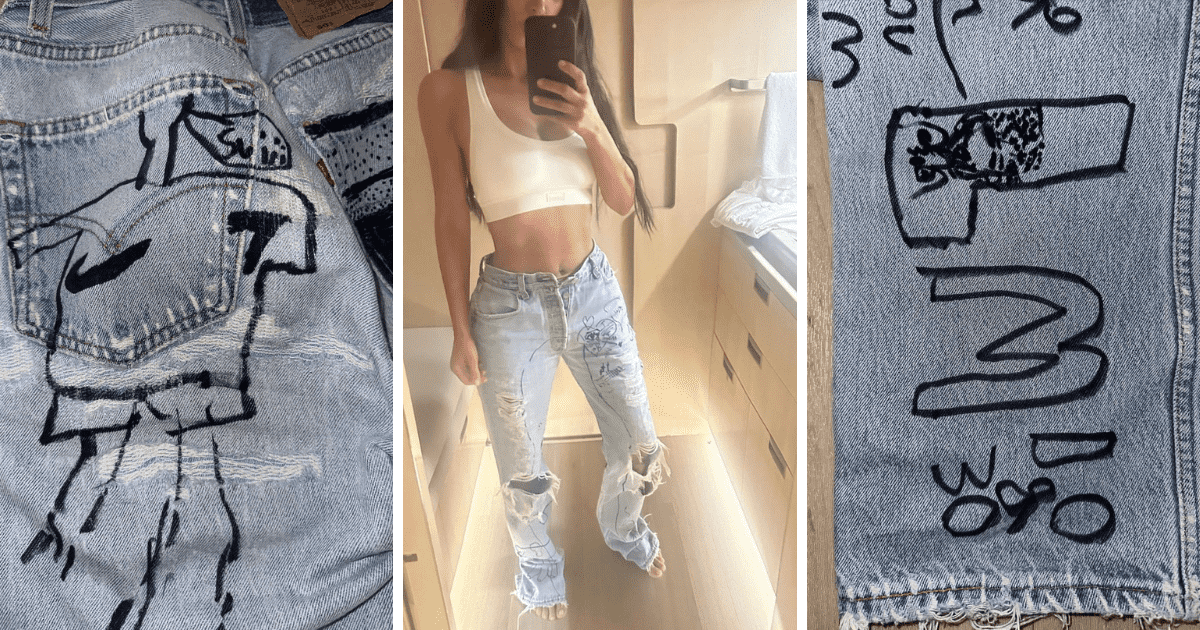 Kim Kardashian displayed her six-pack abs while wearing skintight white crop top and jeans customized by her four children (Instagram/kimkardashian)