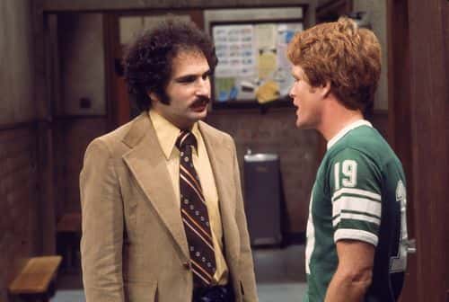 American actor Gabe Kaplan speaks to an unidentified actor in a still from the television series, 'Welcome Back Kotter,' 1977. (Photo by ABC Television/Getty Images)