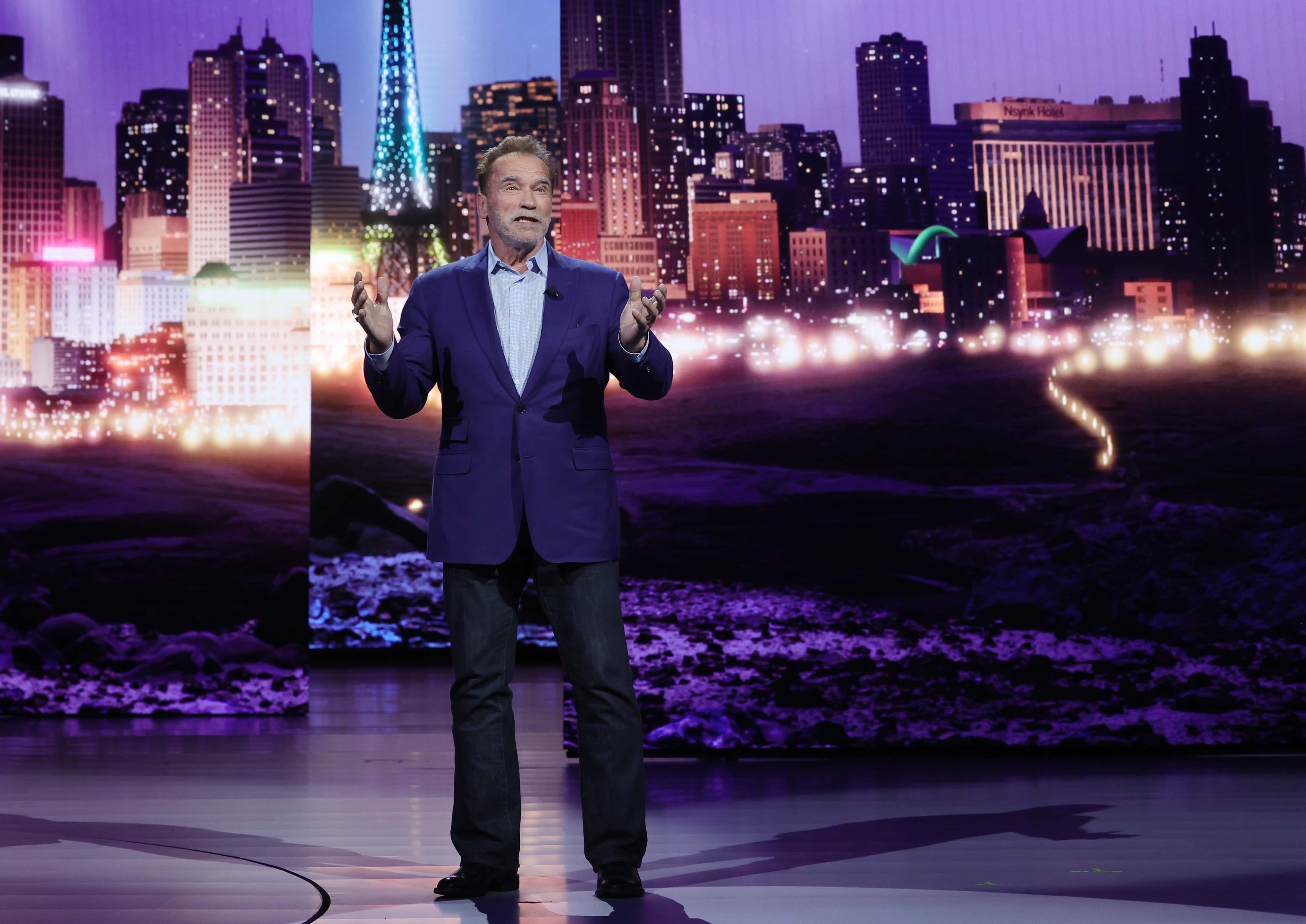 Actor Arnold Schwarzenegger speaks during a keynote address by Chairman of the Board of Management of BMW AG Oliver Zipse at CES 2023 at The Pearl concert theater at Palms Casino Resort on January 04, 2023, in Las Vegas, Nevada. (Photo by Ethan Miller/Getty Images)
