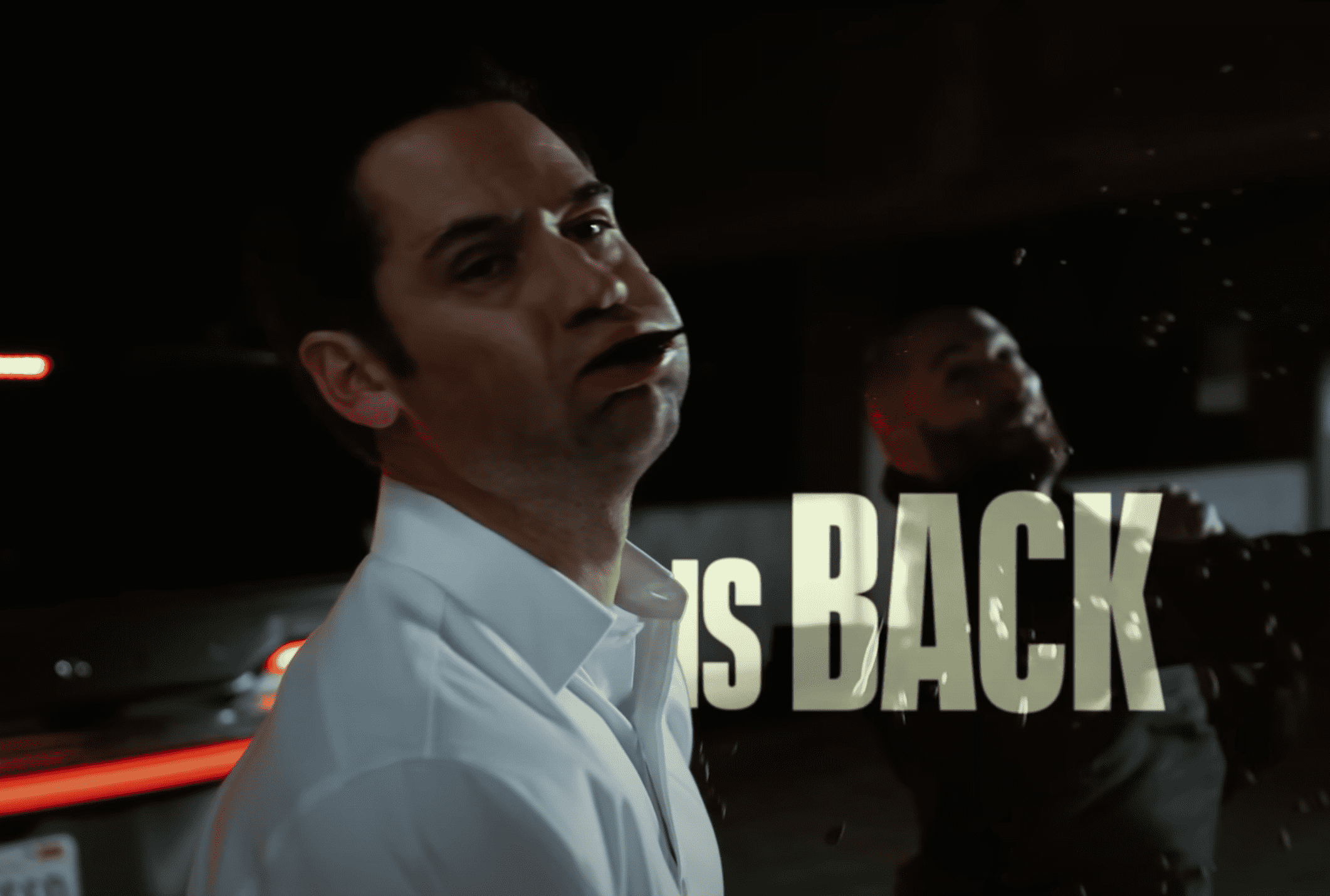 Mickey lies unconscious as two men beat him up in the parking lot (Netflix/YouTube)