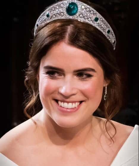 Princess Beatrice added a flash of green to her white bridal gown on her wedding day in October 2018 as she borrowed her grandmother's Greville Emerald Kokoshnik tiara. (Photo via AFP/Getty Images)