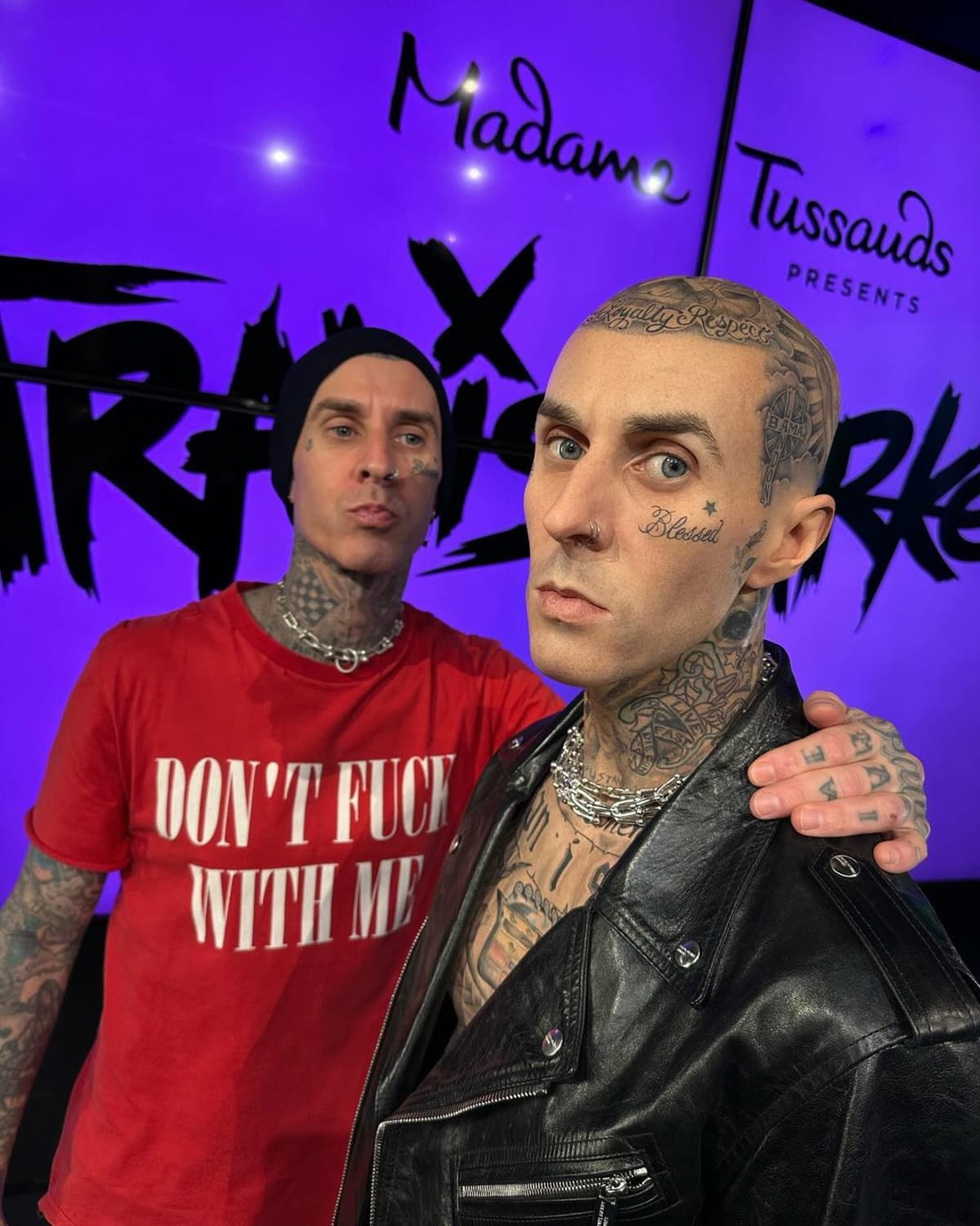 Travis Barker with his wax figure (Instagram/@travisbarker) 