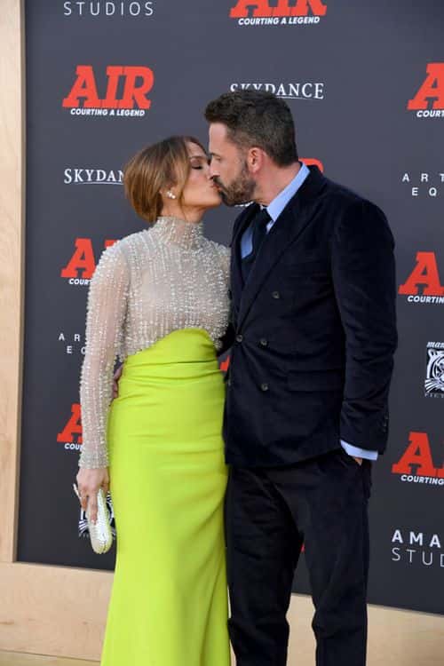 The pair put on a PDA show as they walked the red carpet for Air premier (Getty images)