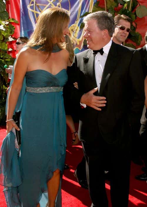 Actor William Shatner (R) and wife Elizabeth Anderson Martin arrives at the 58th Annual Primetime Emmy Awards at the Shrine Auditorium on August 27, 2006 in Los Angeles, California. (Photo by Kevin Winter/Getty Images)