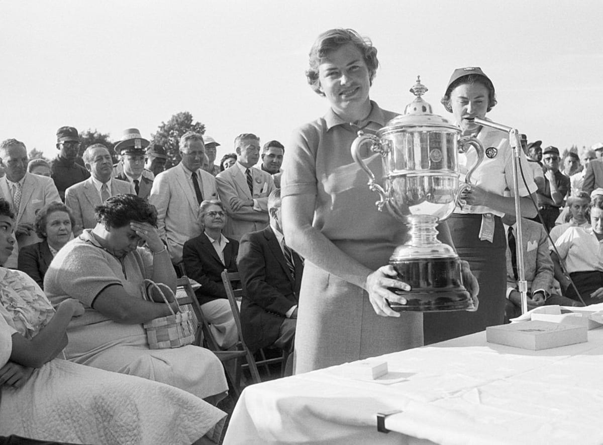 Miss Betsy Rawls of Spartanburg, South Carolina receives the winner's trophy after the final round of the Women's National Open. (Bettman/Getty Images)