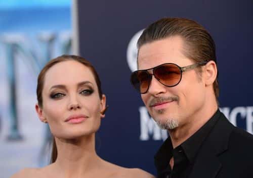 Actress Angelina Jolieand Brad Pitt arrive at the World Premiere Of Disney's 