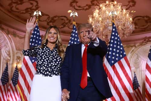 Former U.S. President Donald Trump and former first lady Melania Trump stand together during an event at his Mar-a-Lago home on November 15, 2022 in Palm Beach, Florida. Trump announced that he was seeking another term in office and officially launched his 2024 presidential campaign.