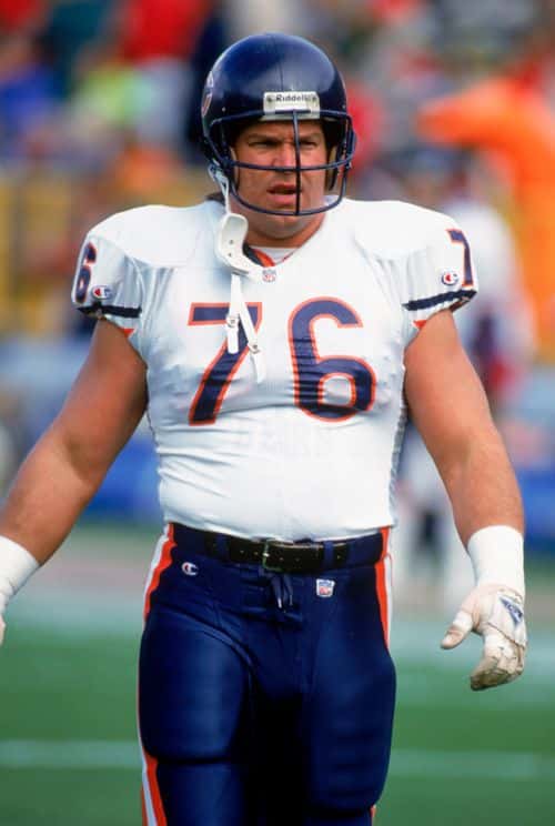 Steve McMichael #76 of the Chicago Bears walks across the field during the game against the Green Bay Packers on October 31,1993 in Green Bay, Wisconsin. The Packers won 17-3.