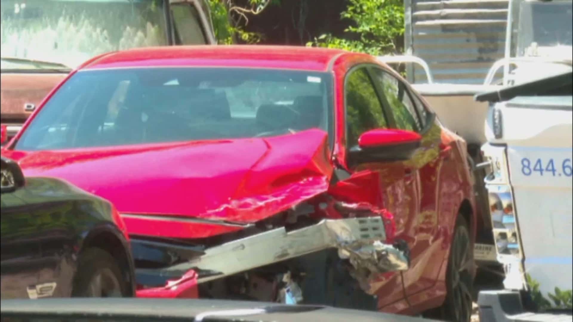Photo of Jamie Lee Komoroski's Toyota Camry after the crash (screenshot from ABCNews4/YouTube)