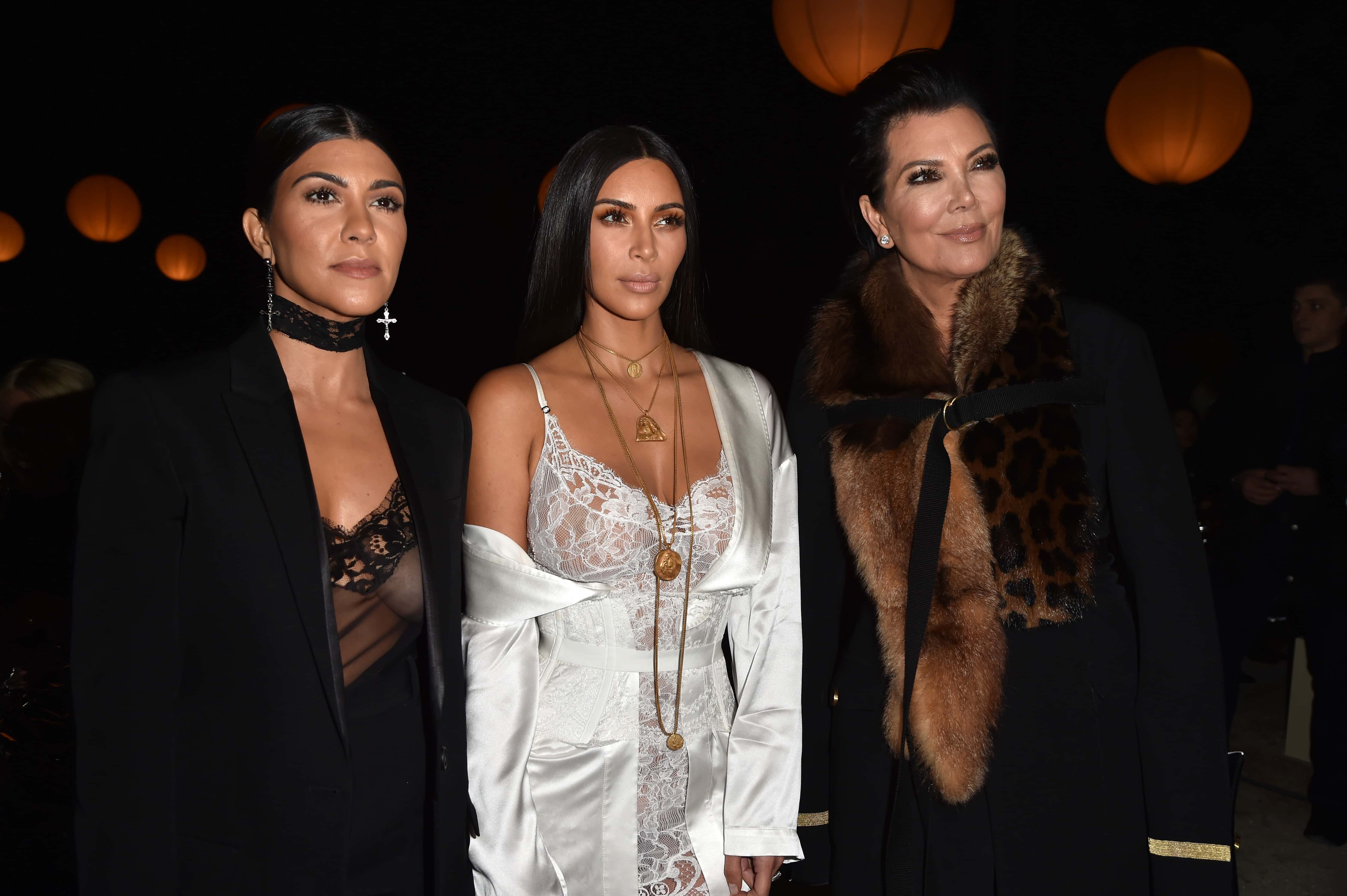 (L-R) Kourtney Kardashian, Kim Kardashian and Kris Jenner attend the Givenchy show as part of the Paris Fashion Week Womenswear Spring/Summer 2017 on October 2, 2016, in Paris, France. (Pascal Le Segretain/Getty Images)