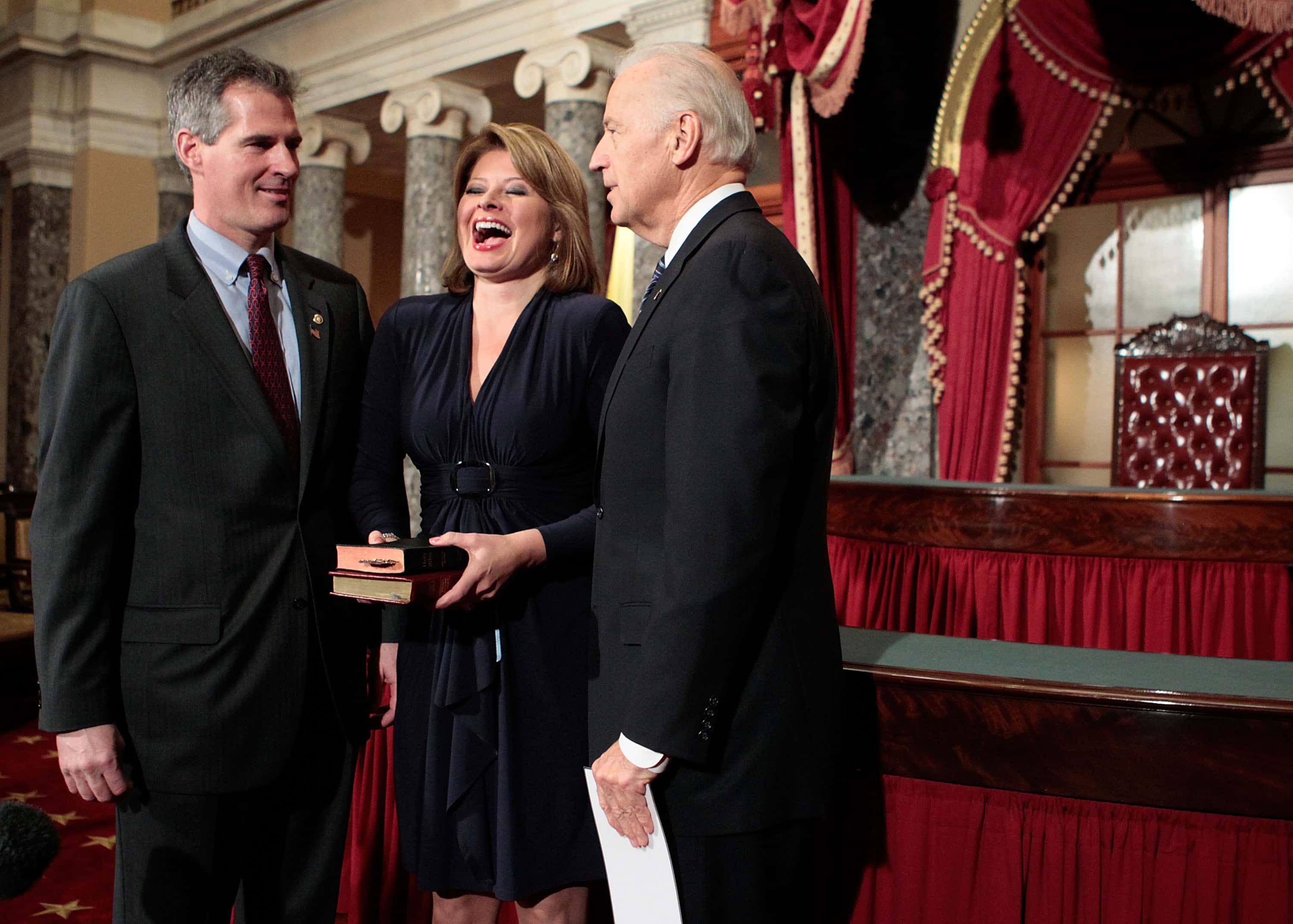 WASHINGTON - FEBRUARY 04: Gail Huff (C), wife of U.S. Senator Scott Brown (R-MA) (L), laughs as Brown participates in a ceremonial swearing-in with Vice President Joseph Biden (R) February 4, 2010 on Capitol Hill in Washington, DC. Brown was sworn in as the newest member of the U.S. Senate after winning a special election for the seat that was held by the late Sen. Edward Kennedy (D-MA). (Photo by Alex Wong/Getty Images)
