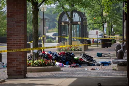 Abandoned belongings near the scene of a shooting at a Fourth of July parade, on July 7, 2022 in Highland Park, Illinois.Authorities have charged Robert “Bobby” E. Crimo III, 22, with seven counts of first-degree murder in the attack that also injured 47, according to published reports.
