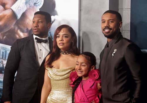 HOLLYWOOD, CALIFORNIA - FEBRUARY 27: (L-R) Jonathan Majors, Tessa Thompson, Mila Davis-Kent and Mich