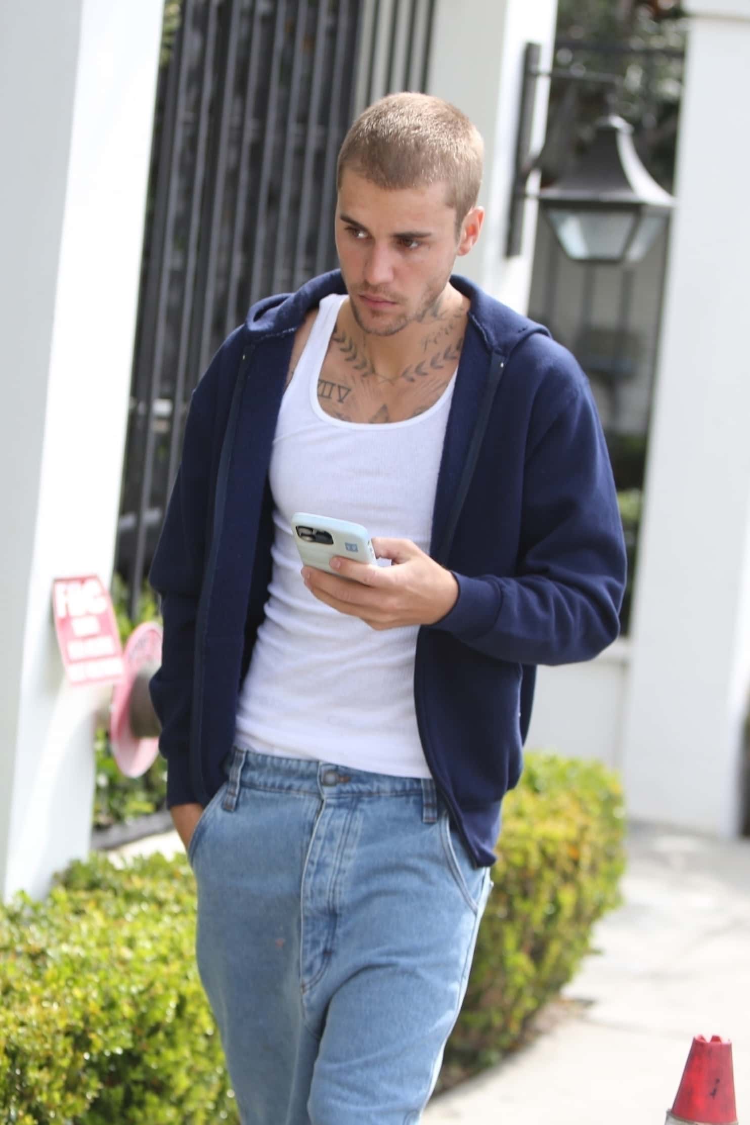  The 29-year-old Canadian Star lost his cool when paparazzi attempted to get his shot as he walked down a Los Angeles road on Wednesday, May 3.  (Backgrid)