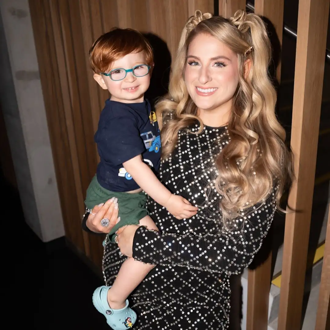 Meghan shared an adorable picture of herself pregnant with her second child while holding her forst born in her arms (meghantrainor/Instagram) 