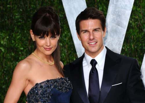 Actress Katie Holmes (L) and actor Tom Cruise arrives at the 2012 Vanity Fair Oscar Party hosted by Graydon Carter at Sunset Tower on February 26, 2012 in West Hollywood, California.