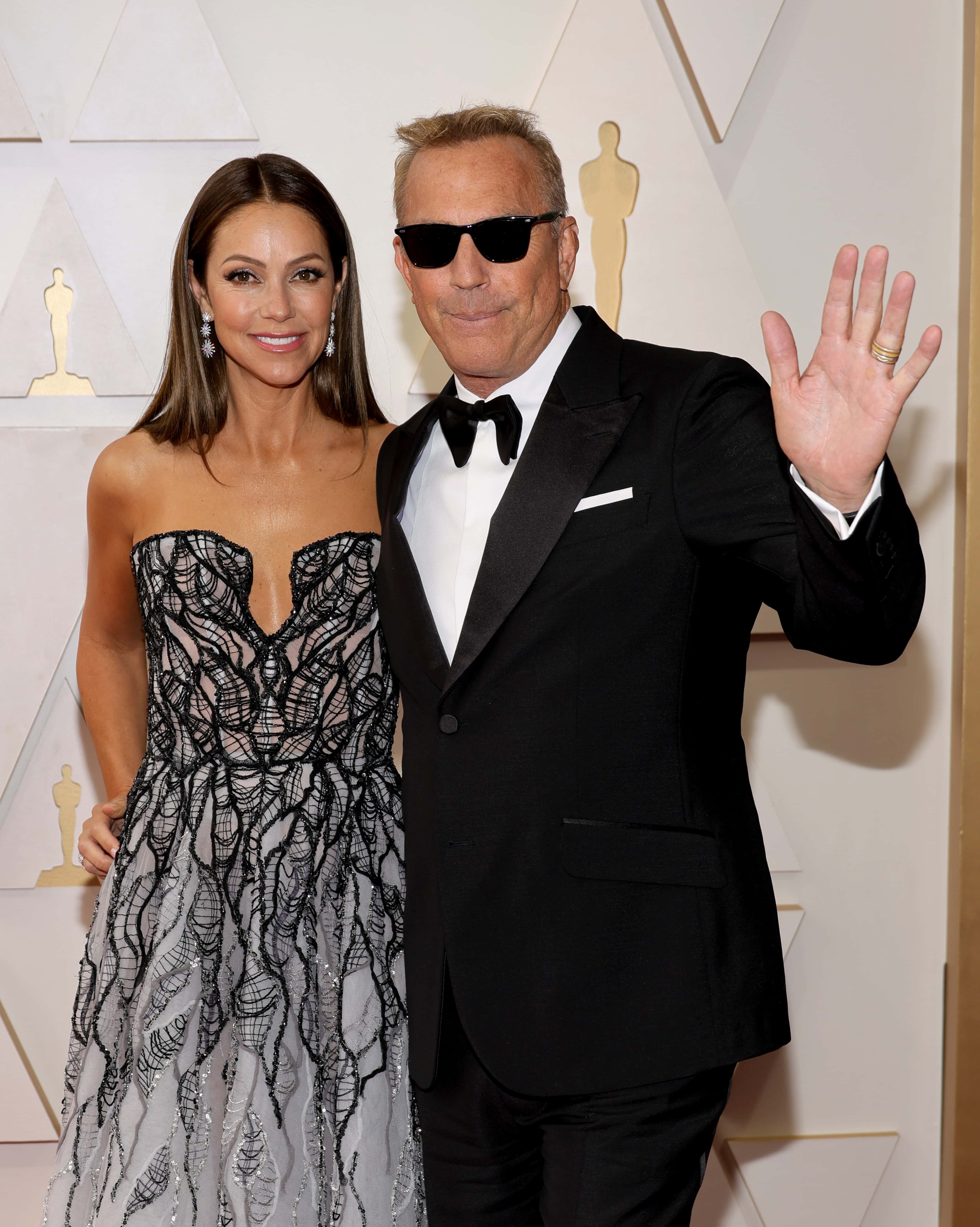 (L-R) Christine Baumgartner and Kevin Costner attend the 94th Annual Academy Awards at Hollywood and Highland on March 27, 2022, in Hollywood, California. (Photo by Mike Coppola/Getty Images)