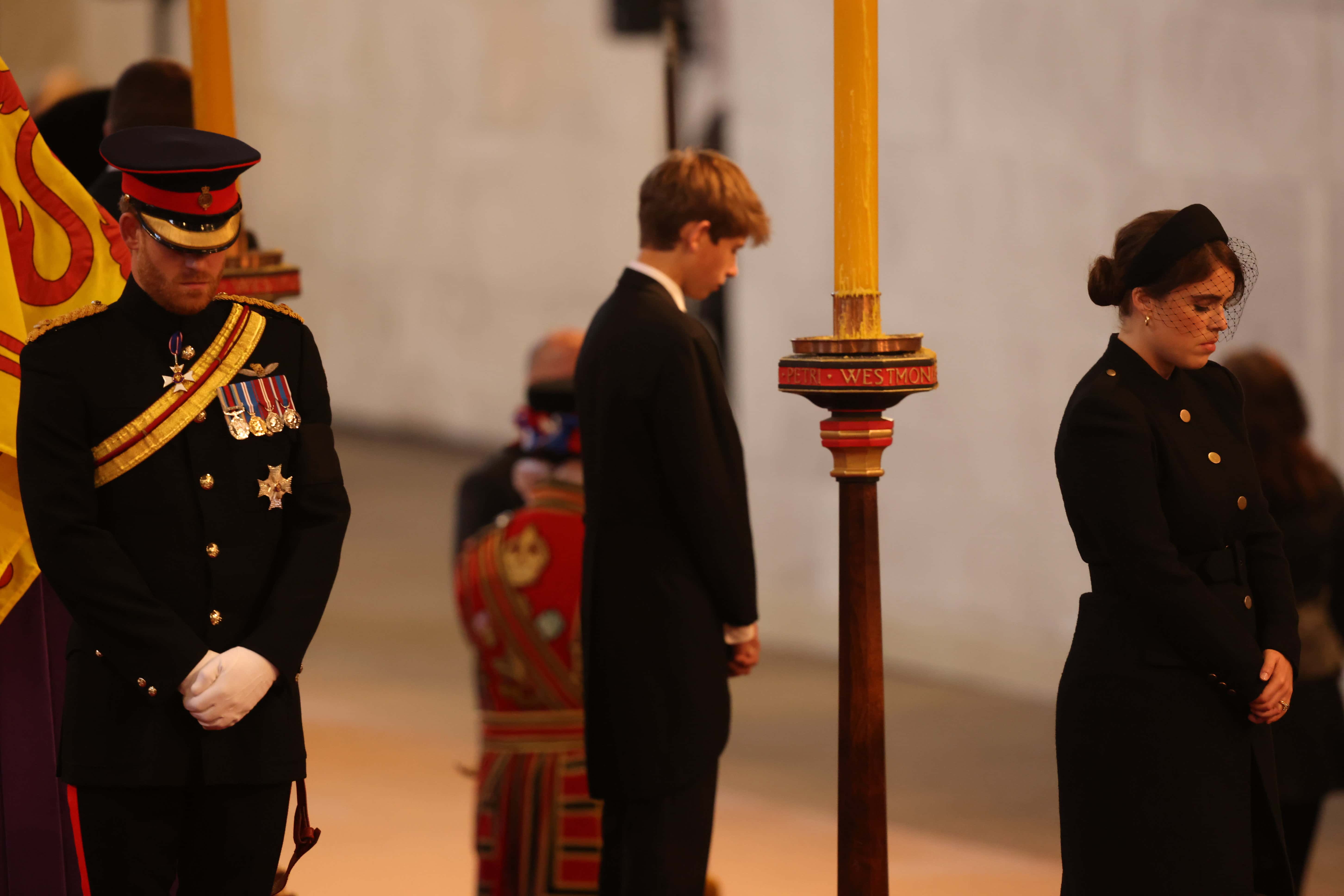 Queen Elizabeth II 's grandchildren Prince Harry, Duke of Sussex, James, Viscount Severn and Princess Eugenie inside Westminster Hall on September 17, 2022 in London, England. Queen Elizabeth II's grandchildren mount a family vigil over her coffin lying in state in Westminster Hall. Queen Elizabeth II died at Balmoral Castle in Scotland on September 8, 2022, and is succeeded by her eldest son, King Charles III.