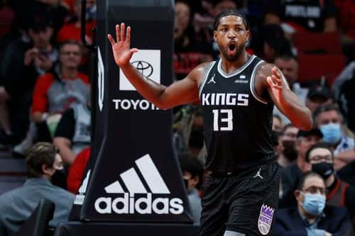 Tristan Thompson #13 of the Sacramento Kings reacts during the fourth quarter against the Portland Trail Blazers at Moda Center on October 20, 2021 in Portland, Oregon. NOTE TO USER: User expressly acknowledges and agrees that, by downloading and or using this photograph, User is consenting to the terms and conditions of the Getty Images License Agreement.