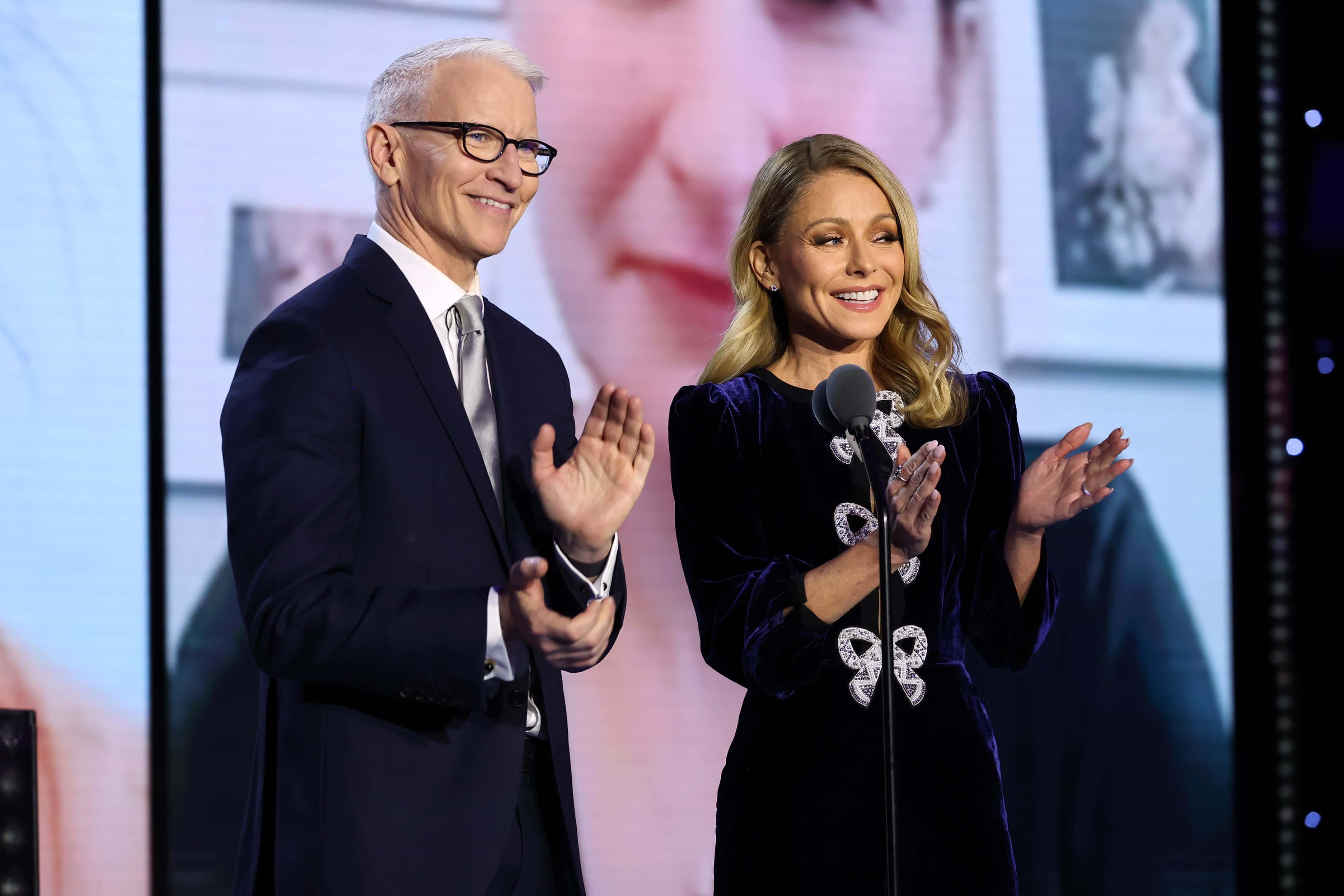 Anderson Cooper and Kelly Ripa speak onstage during the 16th annual CNN Heroes: An All-Star Tribute at the American Museum of Natural History on December 11, 2022 in New York City.