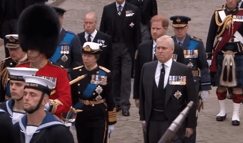 Prince andrew was seen biting hios lipa and holding back his tears during the Queen's funeral procession to Westminster Abbey (Screenchot from Independent/YouTube)