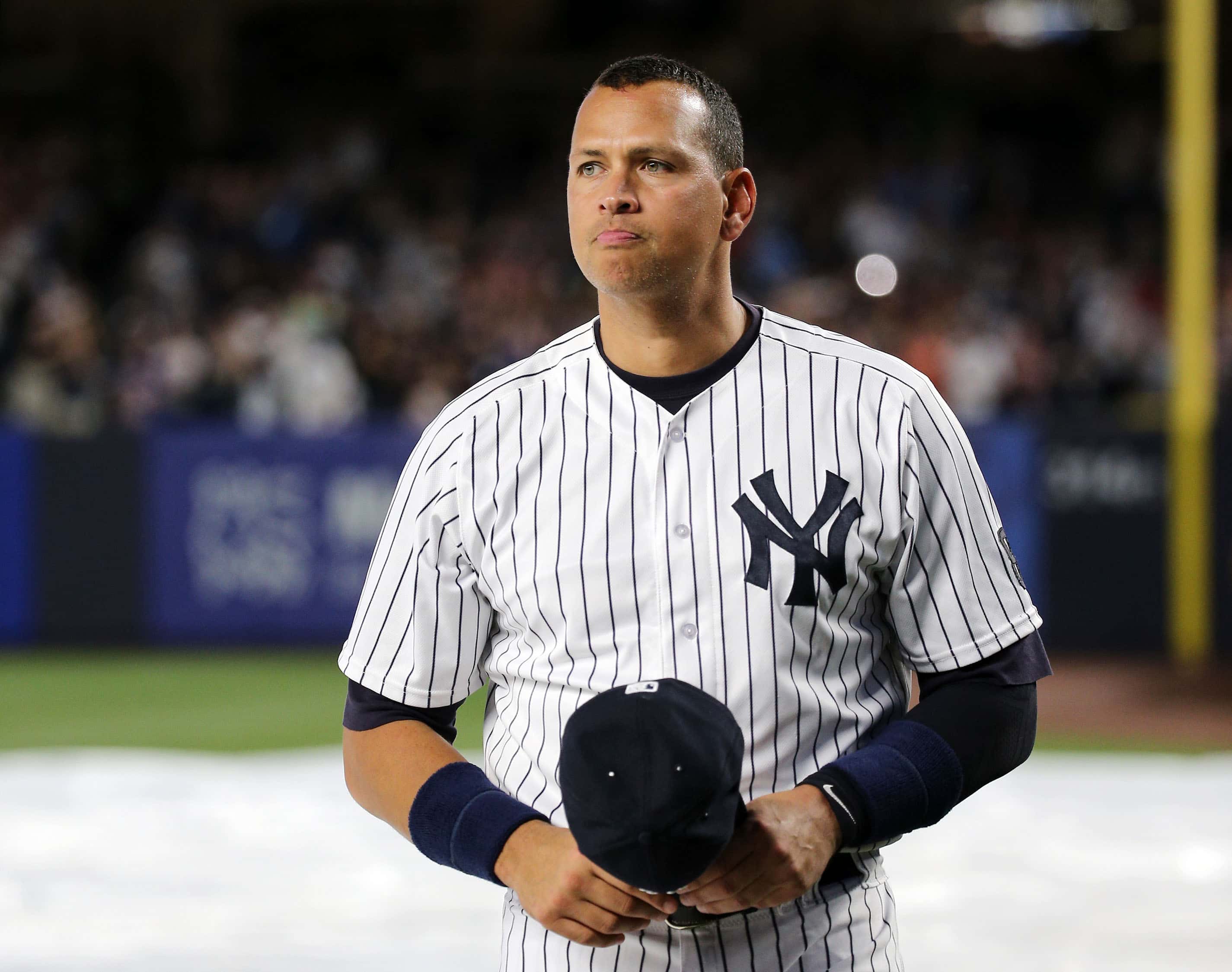 Alex Rodriguez #13 of the New York Yankees looks on after being introduced for a ceremony honoring his retirement from baseball prior to the game against the Tampa Bay Rays on August 12, 2016 at Yankee Stadium in the Bronx borough of New York City.