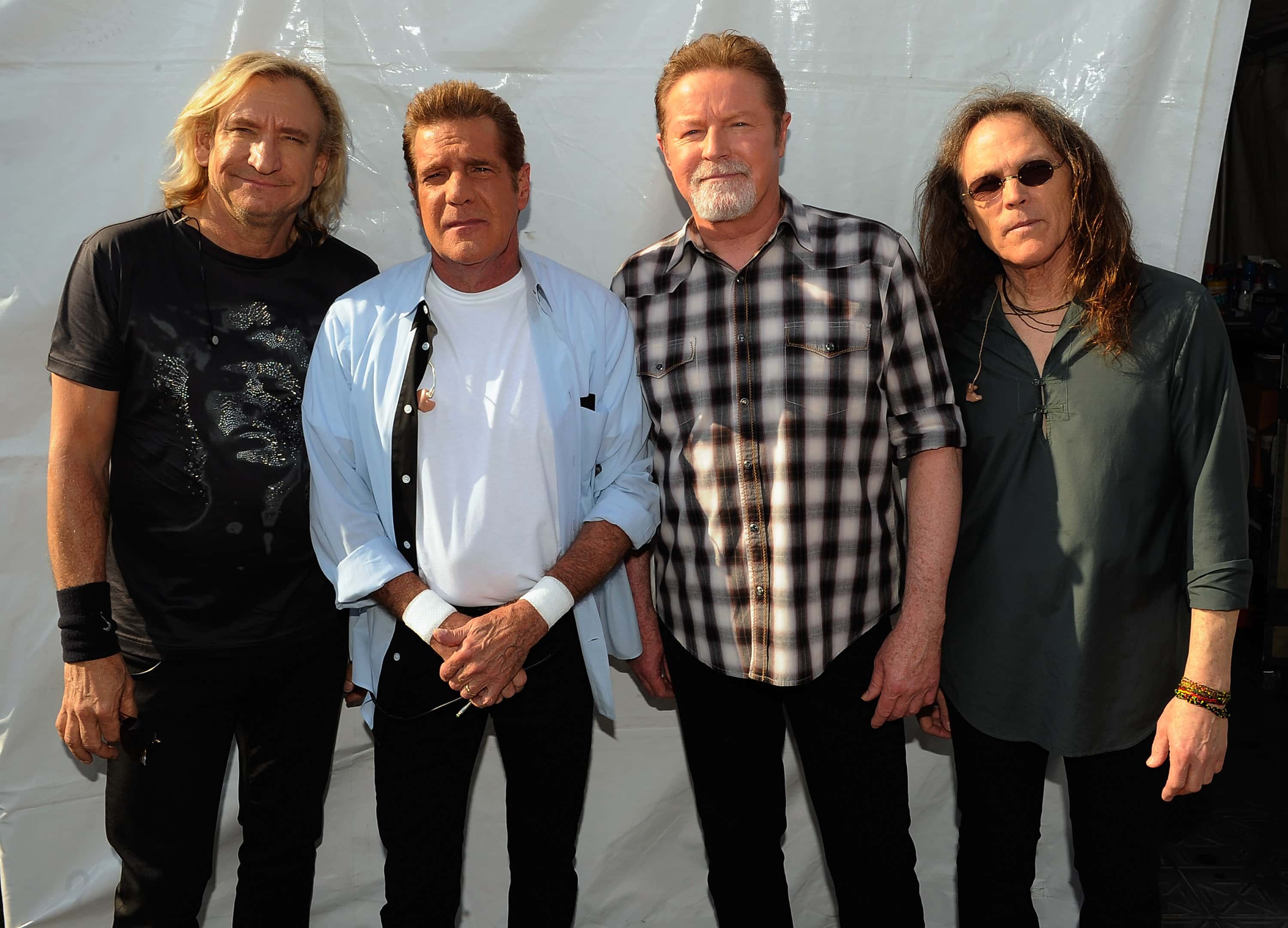 Joe Walsh, Glenn Frey, Don Henley and Timothy B. Schmit of the Eagles backstage during the 2012 New Orleans Jazz & Heritage Festival - Day 6 at the Fair Grounds Race Course on May 5, 2012 in New Orleans, Louisiana.