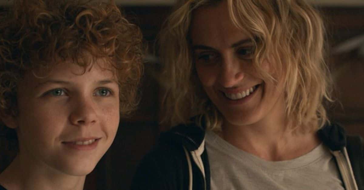 Colin O’Brien and Taylor Schilling in 'Dear Edward' on Apple TV+ (Apple TV+)