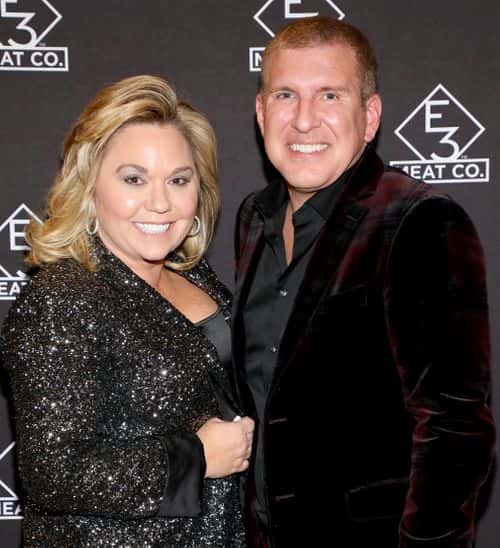 NASHVILLE, TENNESSEE - NOVEMBER 20: Julie Chrisley (L) and Todd Chrisley attend the grand opening of
