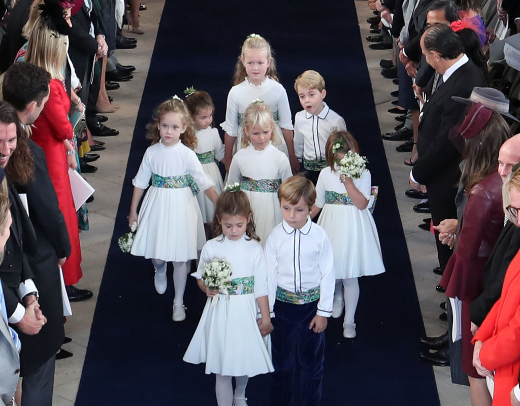 The bridesmaids and pageboys, including Princess Charlotte (back left) and Prince George (back right) walk down the aisle following the wedding of Princess Eugenie of York and Jack Brooksbank at St George's Chapel in Windsor Castle on October 12, 2018, in Windsor, England. (Getty Images)