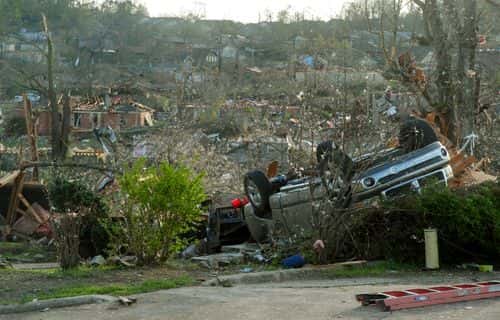 Homes damaged by a tornado are seen on March 31, 2023 in Little Rock, Arkansas. Tornados damaged hundreds of homes and buildings Friday afternoon across a large part of Central Arkansas. Governor Sarah Huckabee Sanders declared a state of emergency after the catastrophic storms that hit on Friday afternoon. According to local reports, the storms killed at least three people.