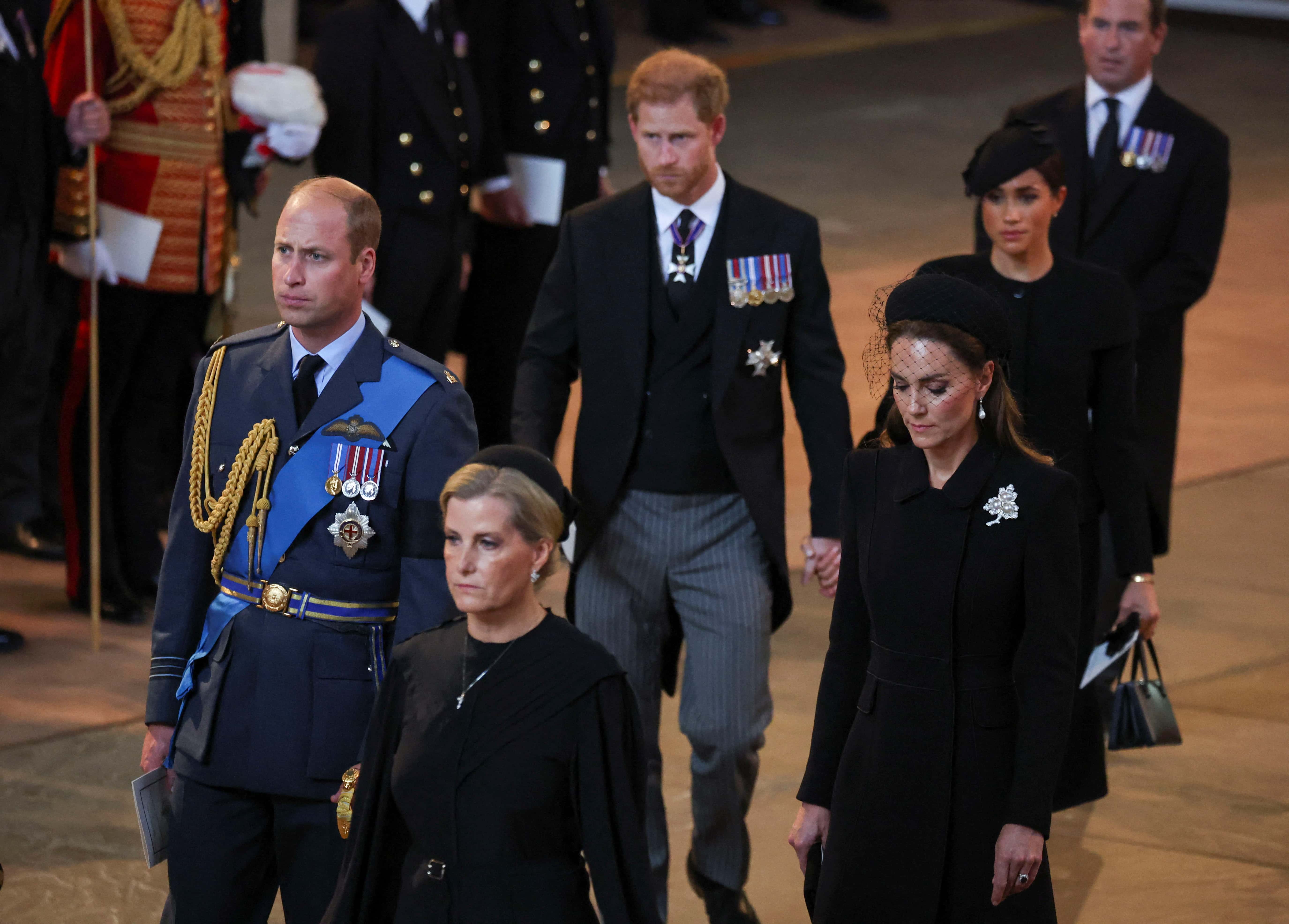 Prince William, Prince of Wales, Sophie, Countess of Wessex, Catherine, Princess of Wales, Prince Harry and Meghan, Duchess of Sussex walk as procession with the coffin of Britain's Queen Elizabeth arrives at Westminster Hall from Buckingham Palace for her lying in state on September 14, 2022 in London, United Kingdom. Queen Elizabeth II's coffin is taken in procession on a Gun Carriage of The King's Troop Royal Horse Artillery from Buckingham Palace to Westminster Hall where she will lay in state until the early morning of her funeral. Queen Elizabeth II died at Balmoral Castle in Scotland on September 8, 2022, and is succeeded by her eldest son, King Charles III.