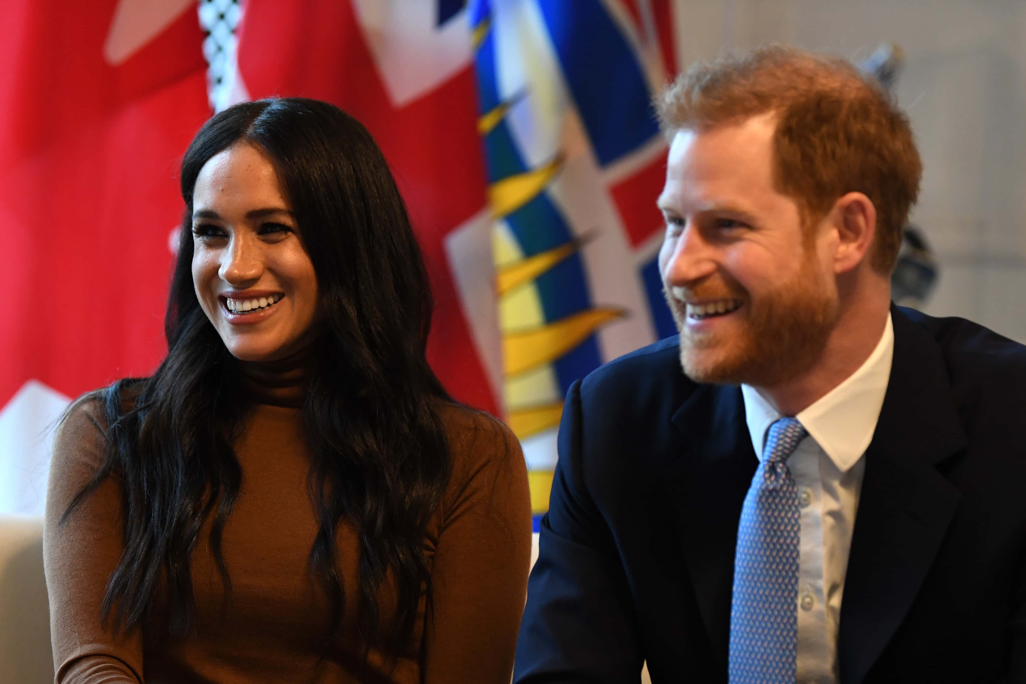 Prince Harry, Duke of Sussex and Meghan, Duchess of Sussex smile during their visit to Canada House in thanks for the warm Canadian hospitality and support they received during their recent stay in Canada, on January 7, 2020, in London, England. (Photo by DANIEL LEAL-OLIVAS - WPA Pool/Getty Images)